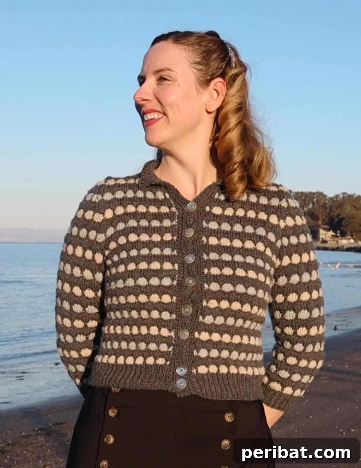 Mohn Cardigan in deep gray with a subtle colorwork pattern