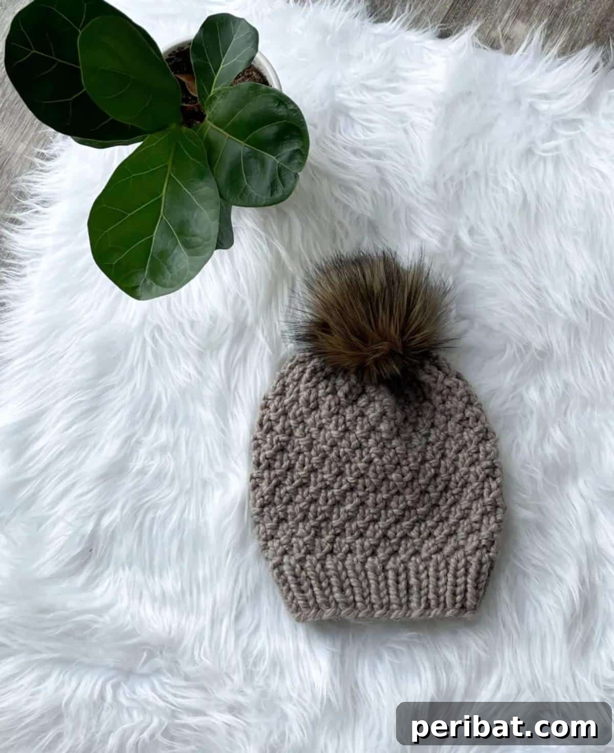 29 Inspiring Circular Knitting Designs 14 A close-up image of a Seed Stitch Knit Hat, showcasing its rich texture and warmth, made with chunky yarn for a quick and cozy winter accessory.