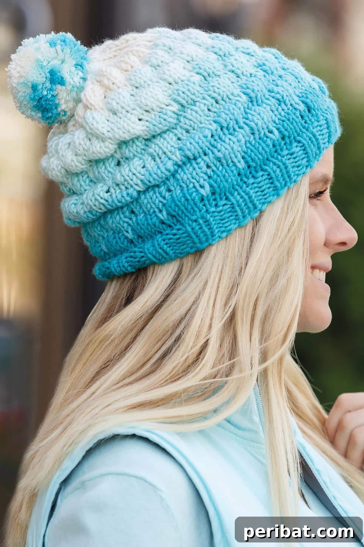 29 Inspiring Circular Knitting Designs 15 A stylish Bubble Beanie Hat, featuring a beautiful gradient effect created with bubble, stockinette, and rib stitches, showcasing its unique textured design.