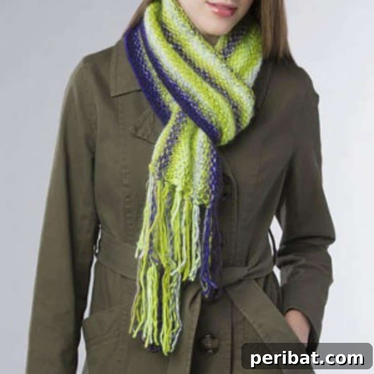 29 Inspiring Circular Knitting Designs 3 A close-up image of the Lime Lightning Linen Scarf, showcasing its vibrant lime green color and a cool, textured linen stitch pattern. Ideal for adding a pop of color to warm-weather attire.