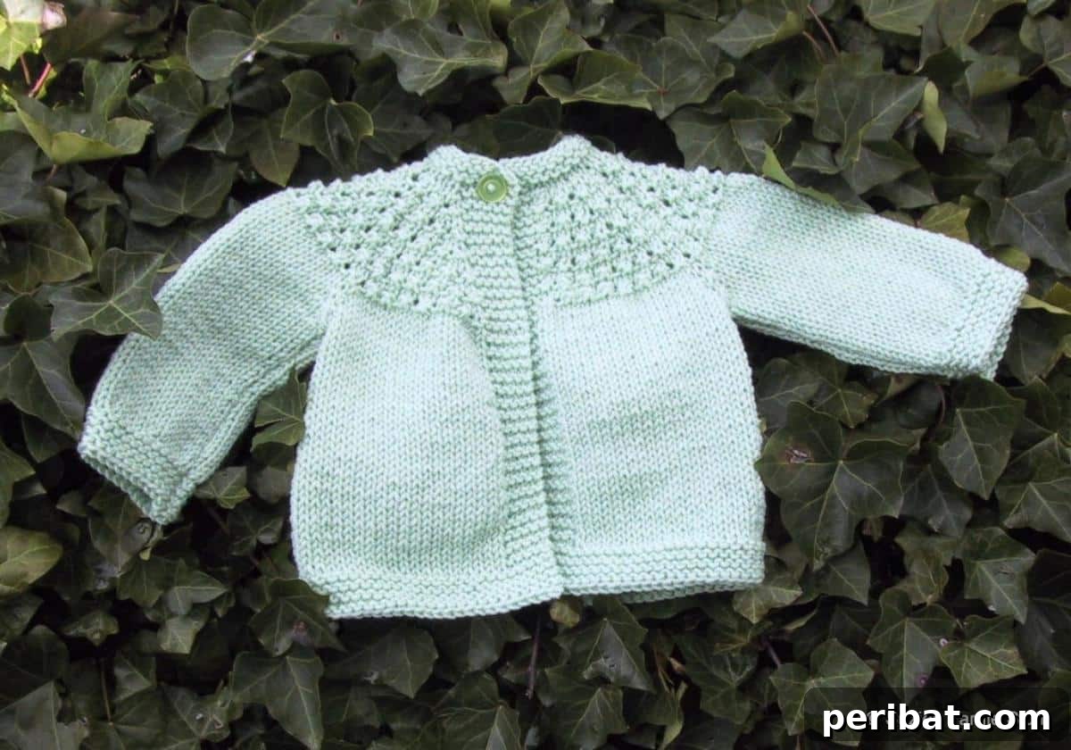 29 Inspiring Circular Knitting Designs 6 A photograph of the 7-Hour Toddler Girl’s Sweater, featuring a cute, rapidly knit design in a vibrant color, emphasizing its quick crafting time and suitability for growing toddlers.