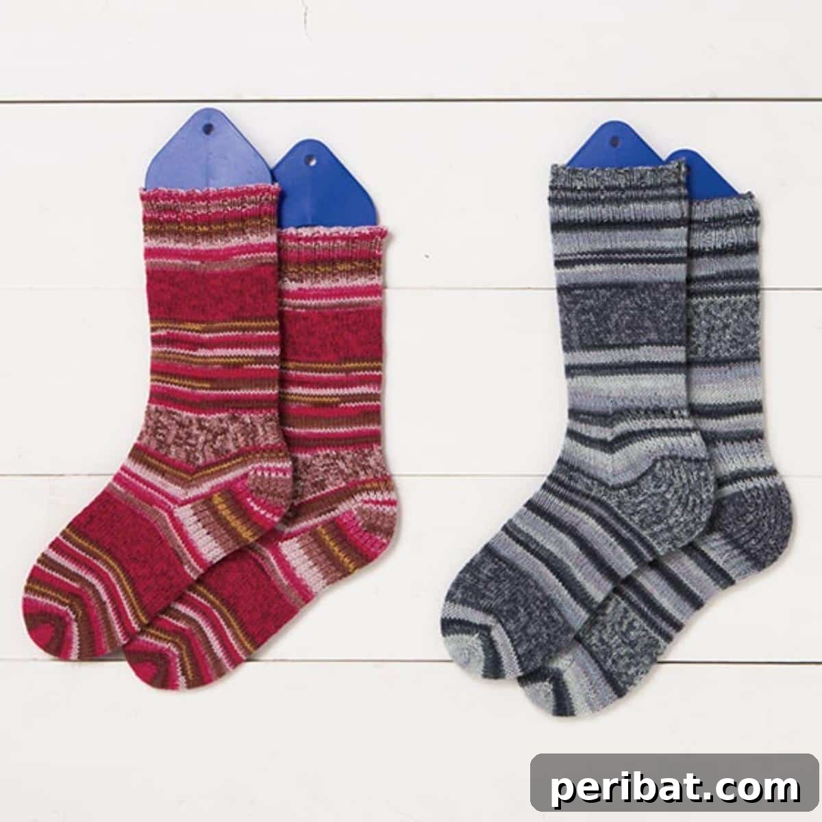 29 Inspiring Circular Knitting Designs 9 A pair of vibrantly colored, hand-knitted socks, showcasing the seamless toe-up construction and the efficiency of knitting two at once using the magic loop method.