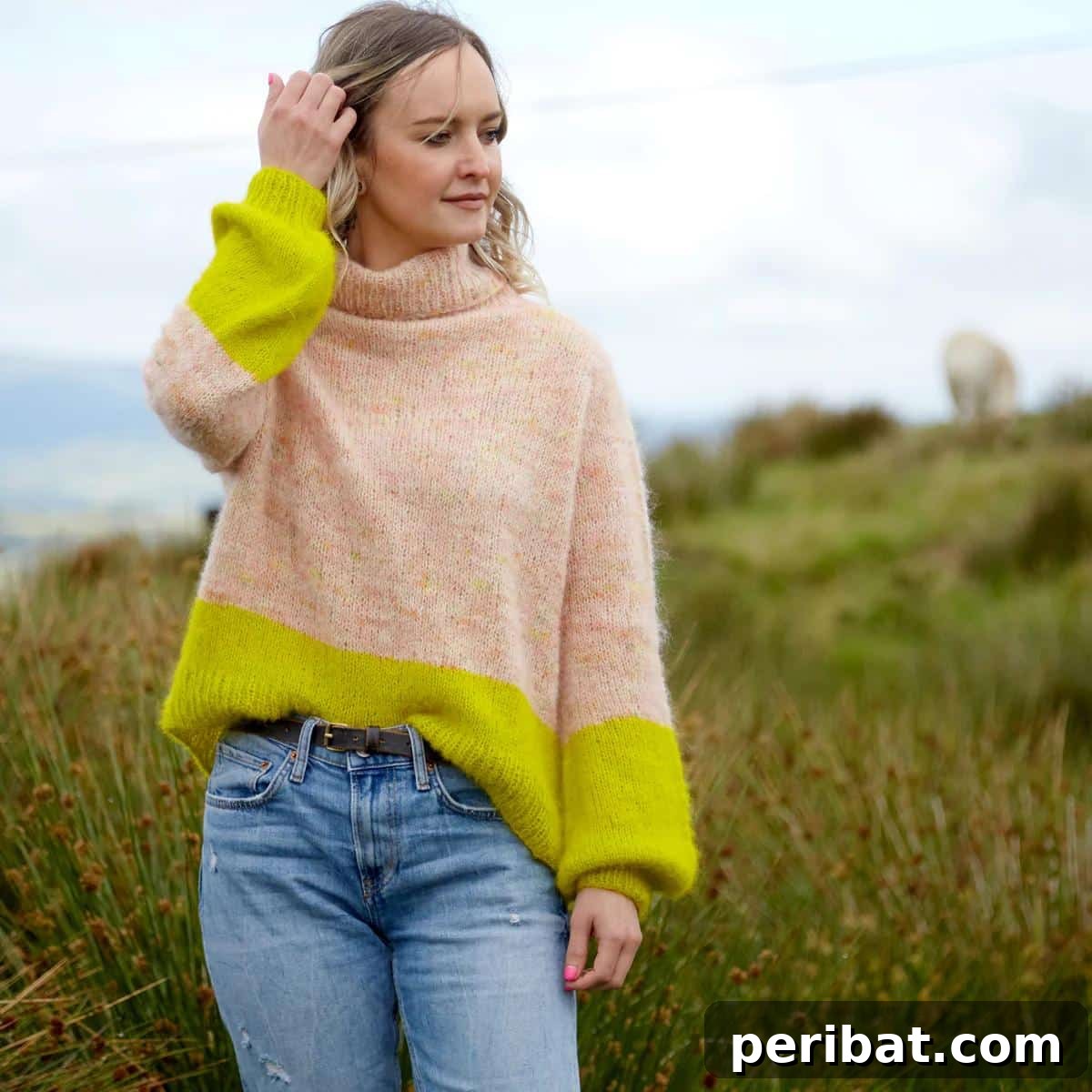Turtle Pouf Sweater, a luxurious turtleneck combining cashmere, merino, and alpaca boucle.
