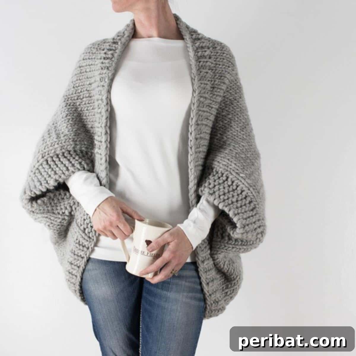 Scoop Shrug Sweater, a super bulky and easy-to-knit shrug for instant warmth.