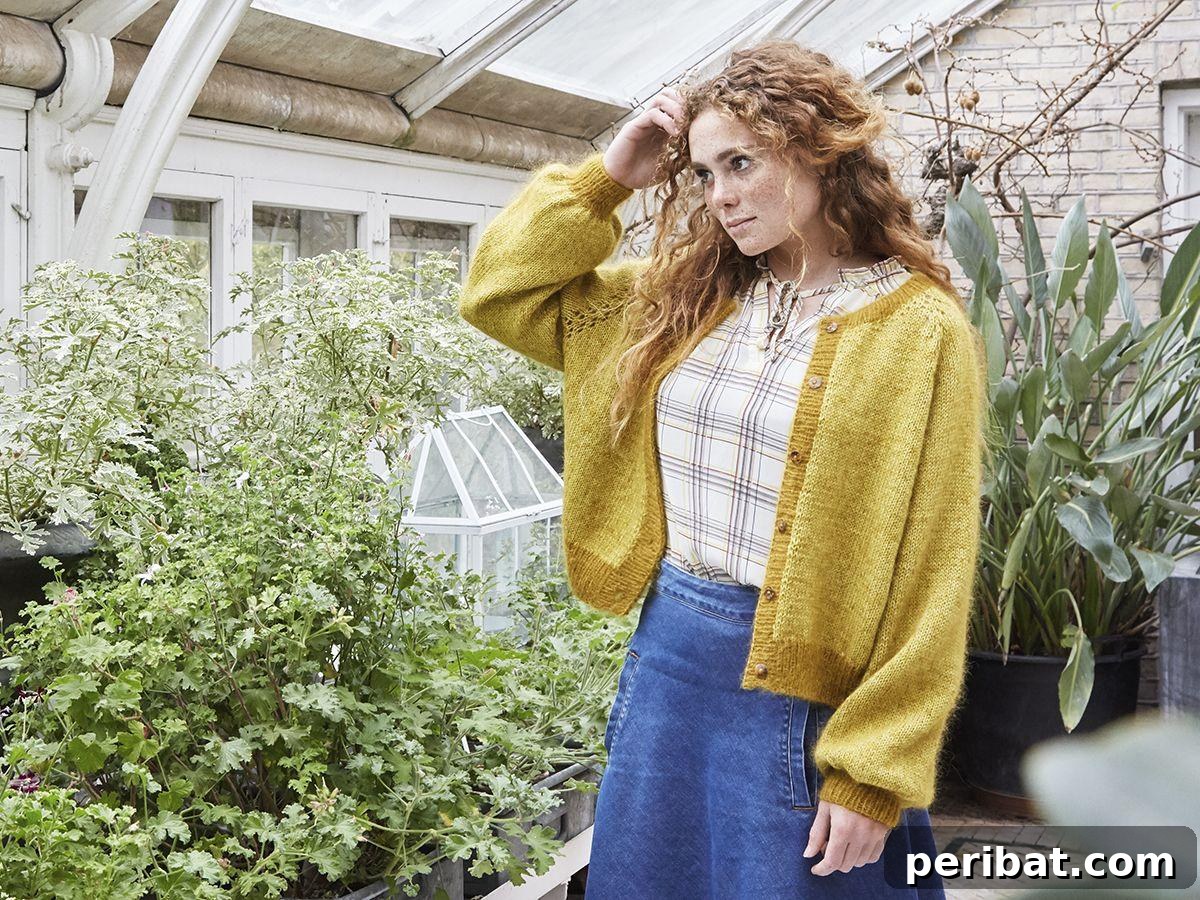 Anneli Sweater, a feminine and comfortable knit with mixed textures and deep raglan armholes.