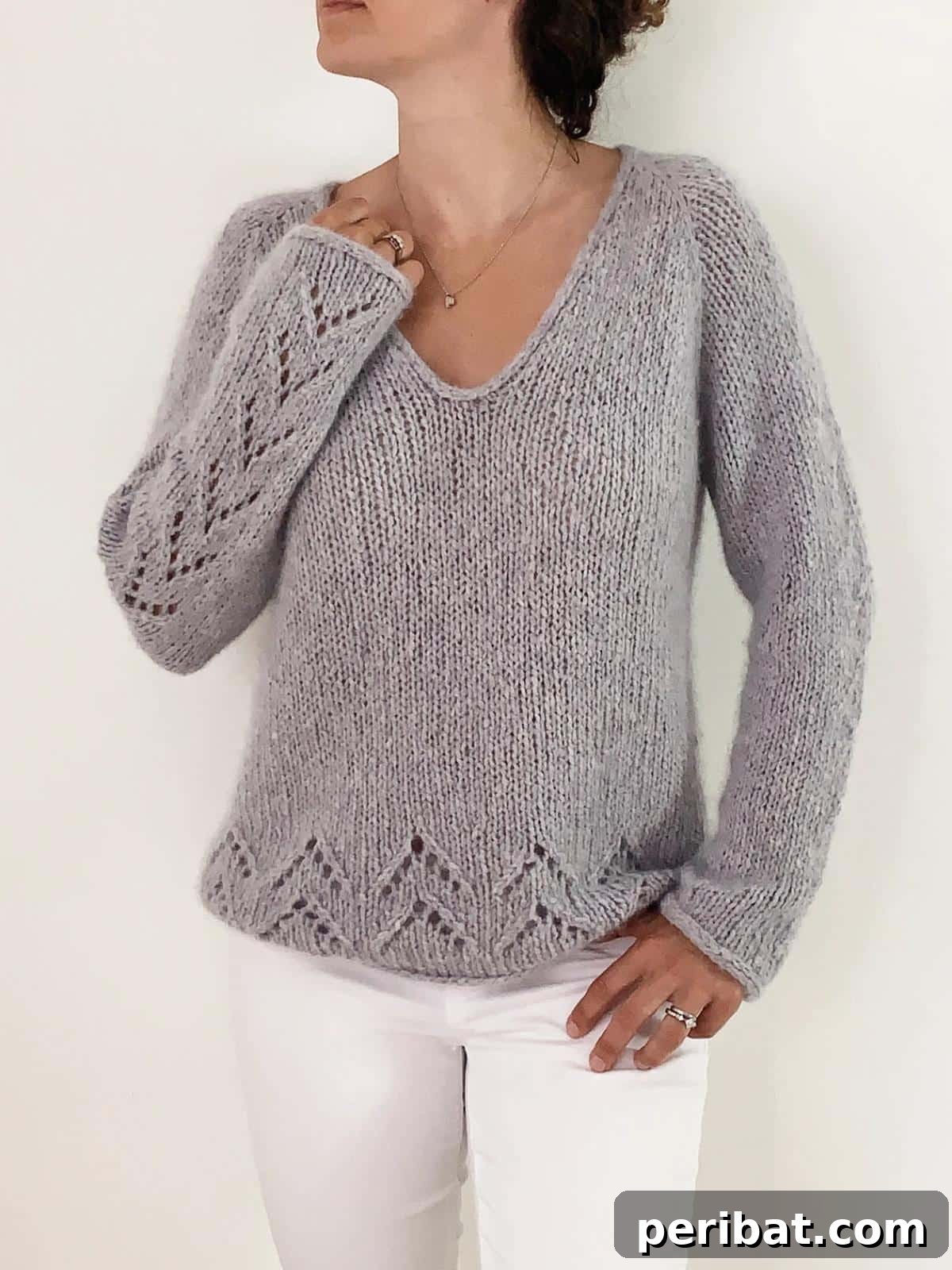 Evermore Pullover Sweater, a simple yet classy top-down knit with V-neck and lace details.