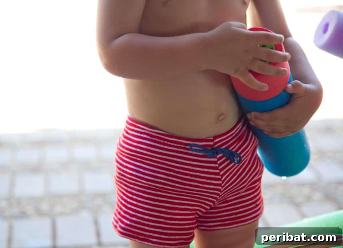 A sporty brief swimsuit for baby boys, designed for comfort and style, especially suitable with a swim diaper.
