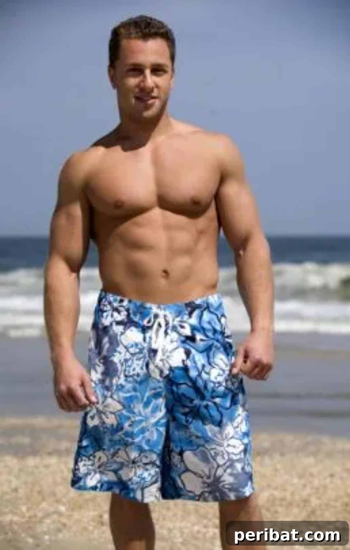 Swim shorts featuring a vibrant floral print, relaxed fit, and a practical drawstring waist.