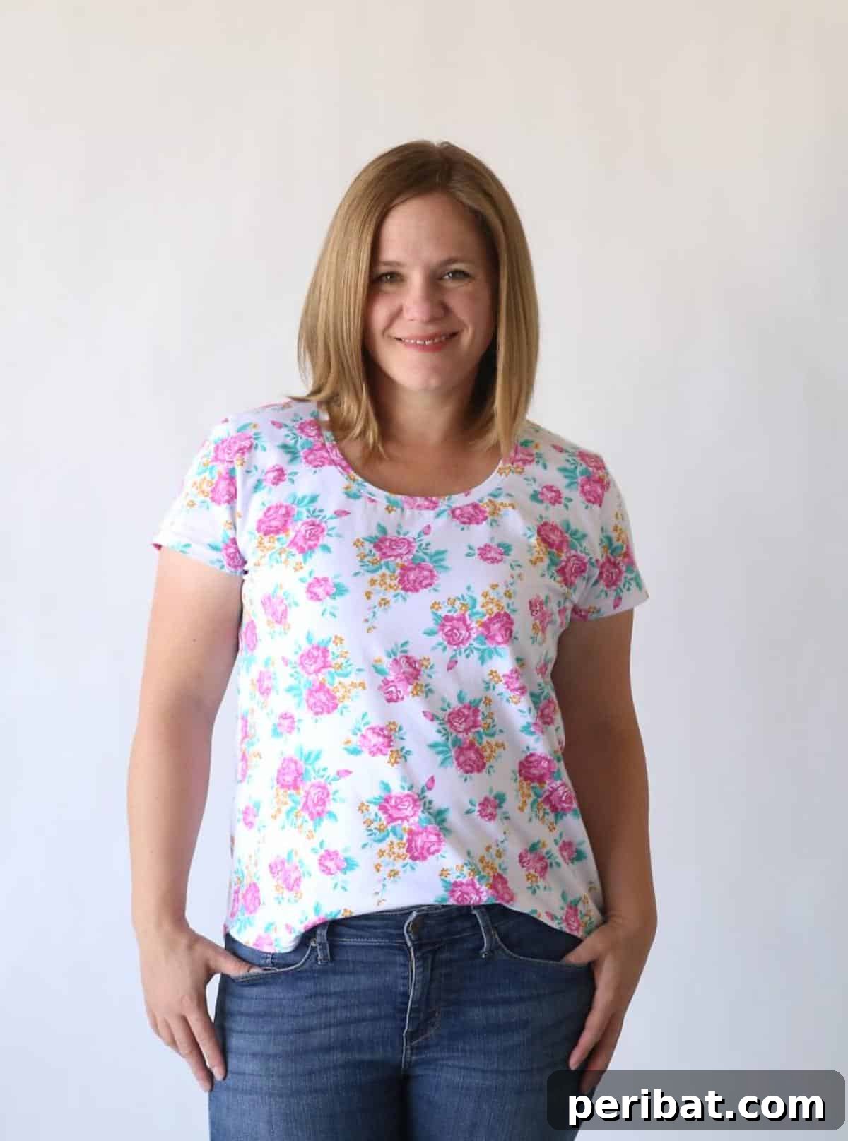 38 Creative T-Shirt Sewing Projects 13 A woman in a classic women's size L tee with a scoop neck and slightly curved hem, illustrating a comfortable and flattering fit.