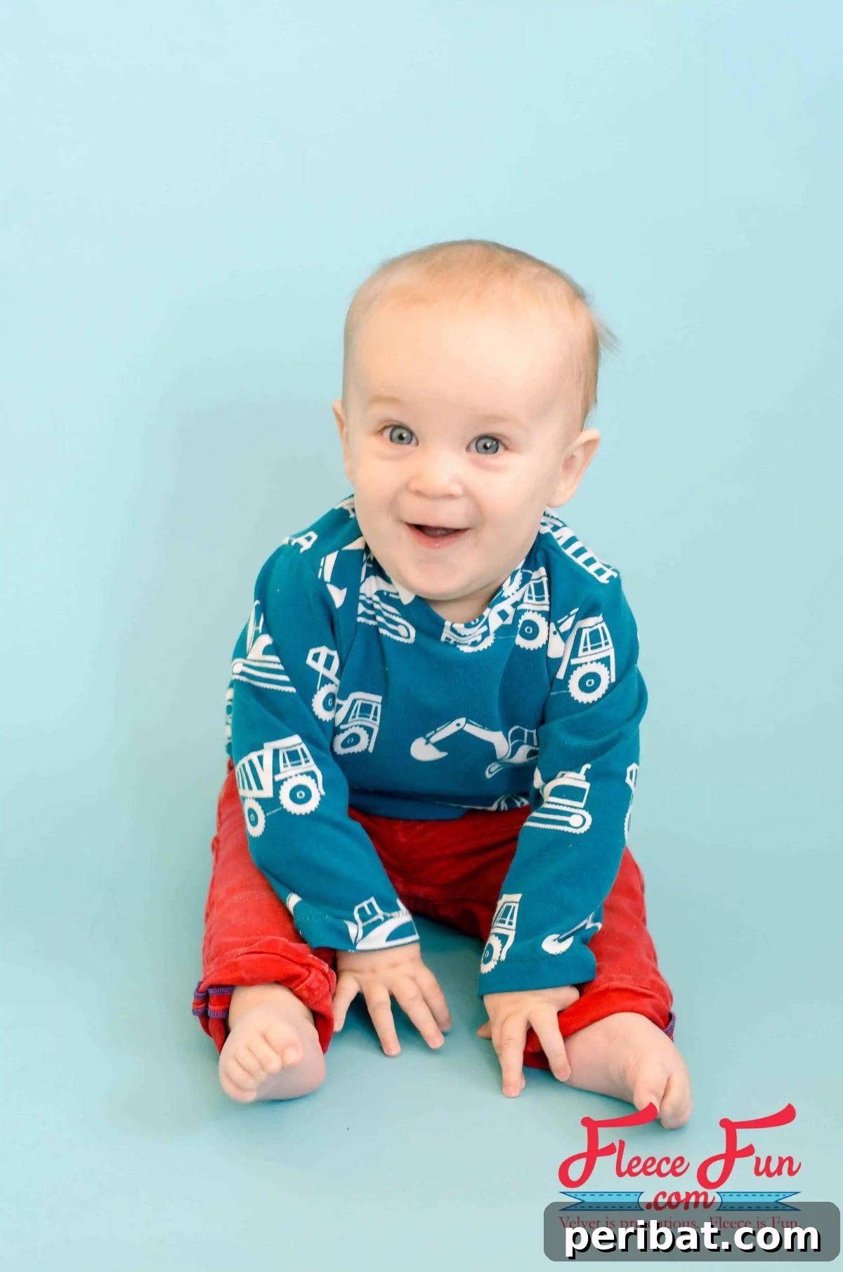 38 Creative T-Shirt Sewing Projects 23 An adorable baby wearing a tiny, cozy baby T-shirt, made from a soft knit fabric, perfect for infant comfort.
