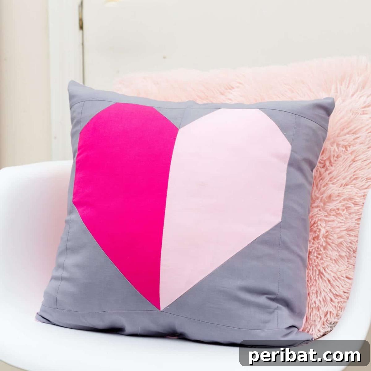 Stitch Your Way to Coziness: 38 Pillow Pattern Ideas 12 Heart Block Pillow