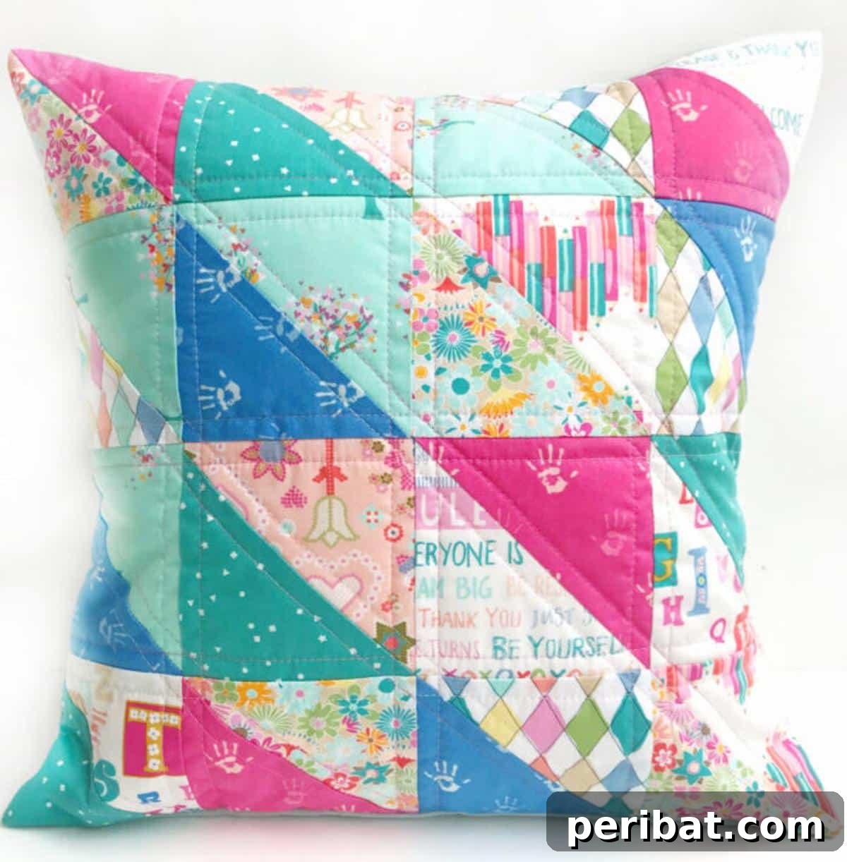 Stitch Your Way to Coziness: 38 Pillow Pattern Ideas 13 Quilted Pillow Using Half-Square Triangles