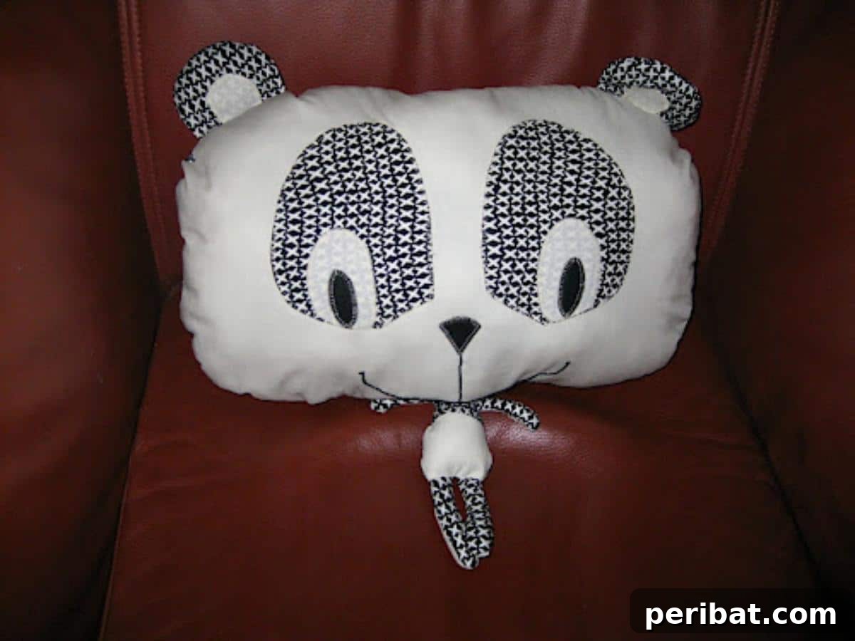 Stitch Your Way to Coziness: 38 Pillow Pattern Ideas 21 Panda Pillow