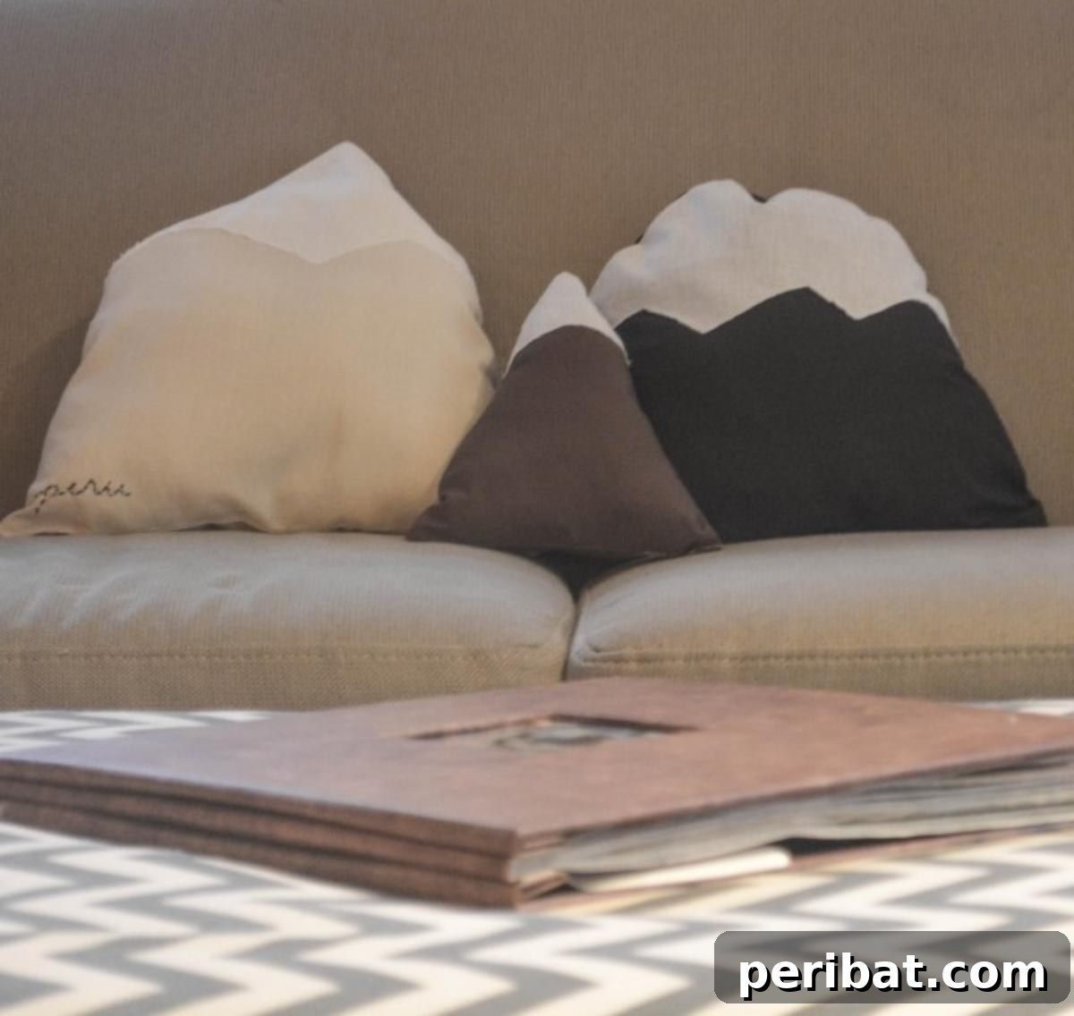 Stitch Your Way to Coziness: 38 Pillow Pattern Ideas 25 DIY Mountain Pillows
