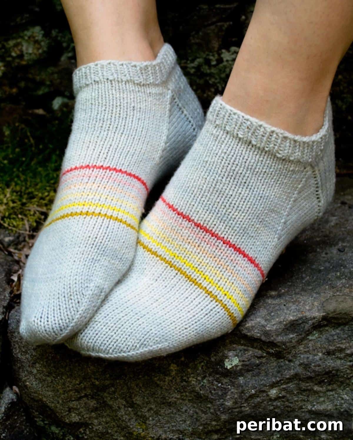 38 Cozy Sock Knitting Patterns 3 Dynamic Sporty Striped Socklets in vivid colors.