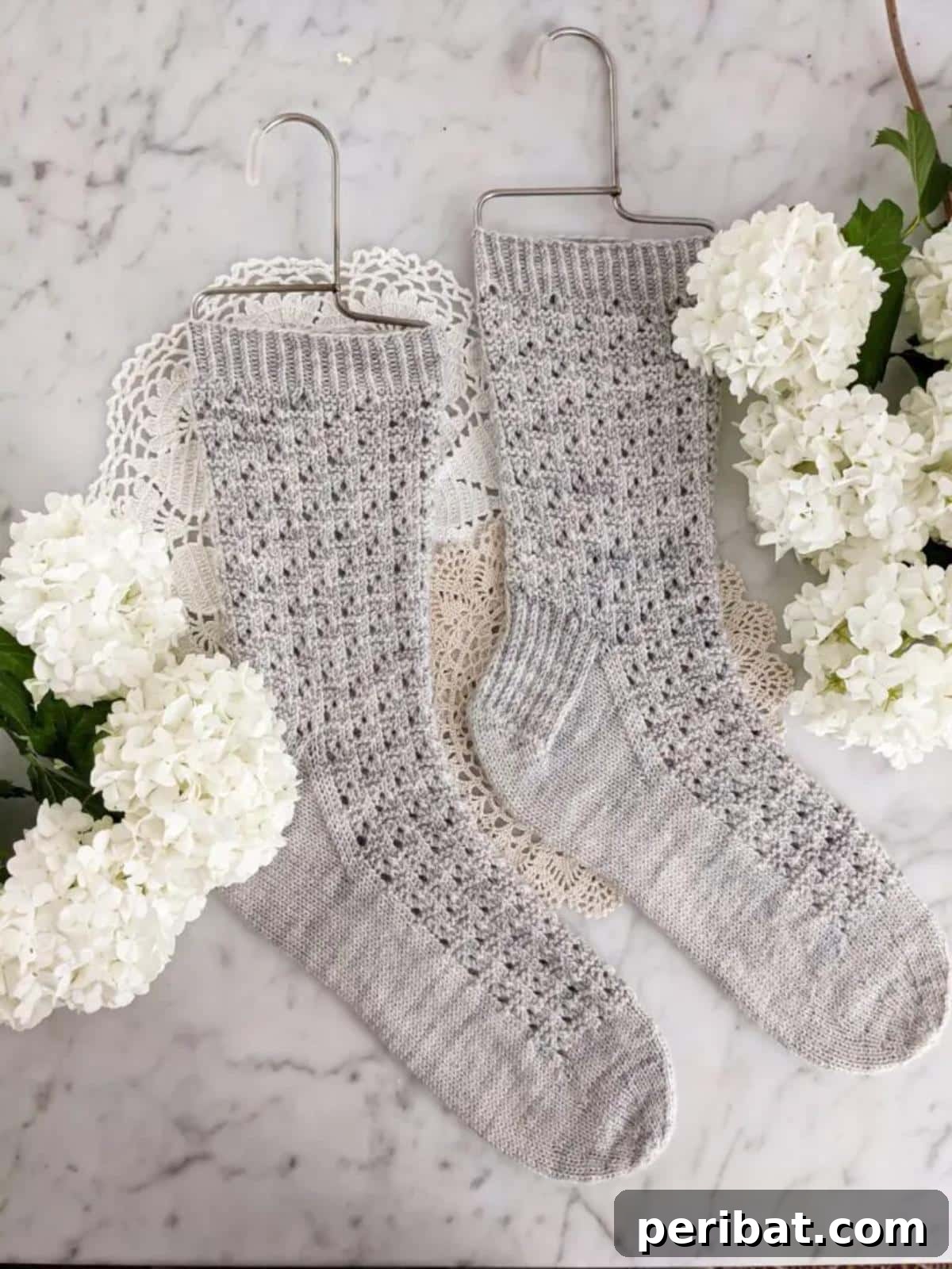 38 Cozy Sock Knitting Patterns 21 Delicate Simple Dainty Texture Socks, perfect for showcasing hand-dyed yarn.
