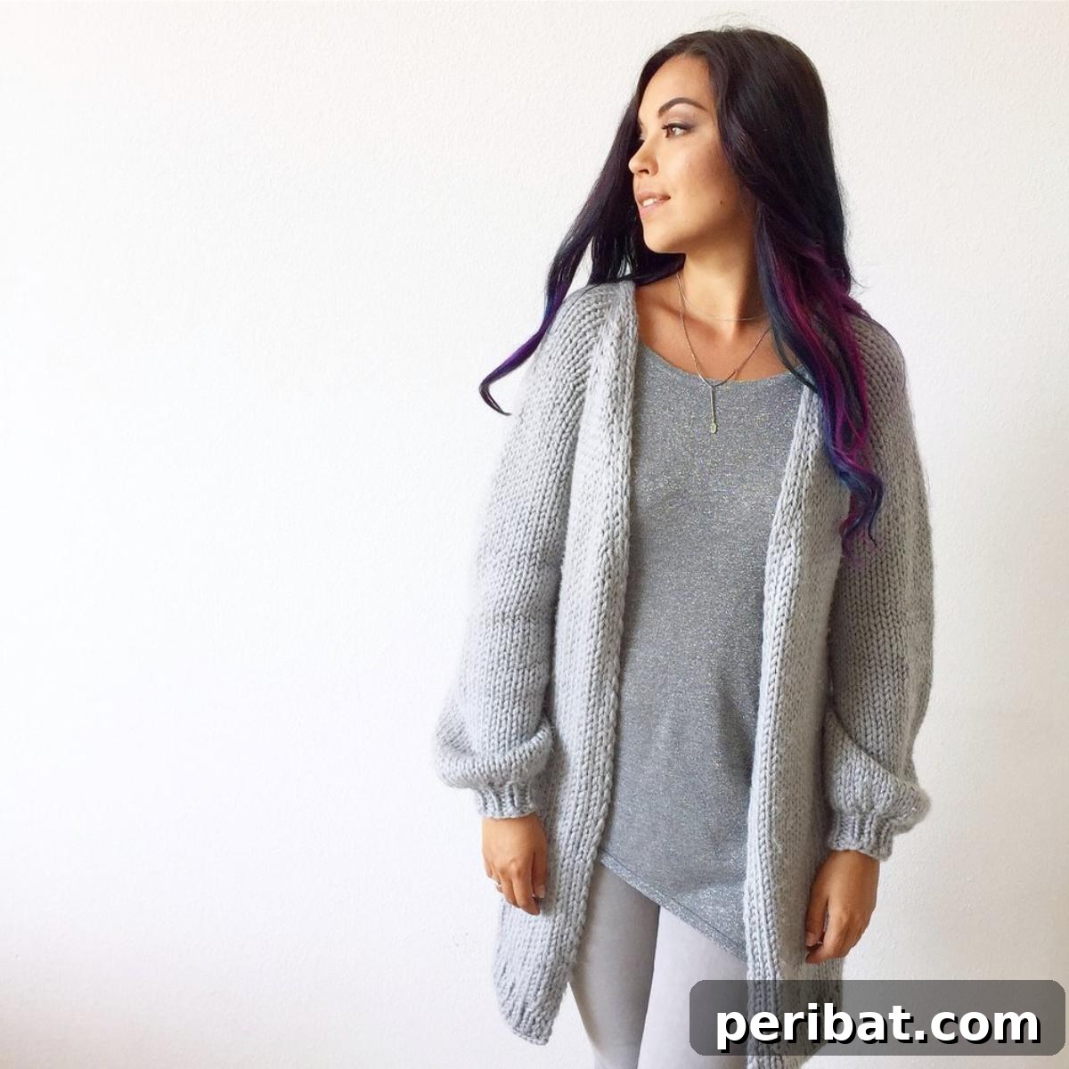A plush Cozy Cloud Cardigan with wide sleeves, designed for ultimate comfort and a relaxed, enveloping feel.