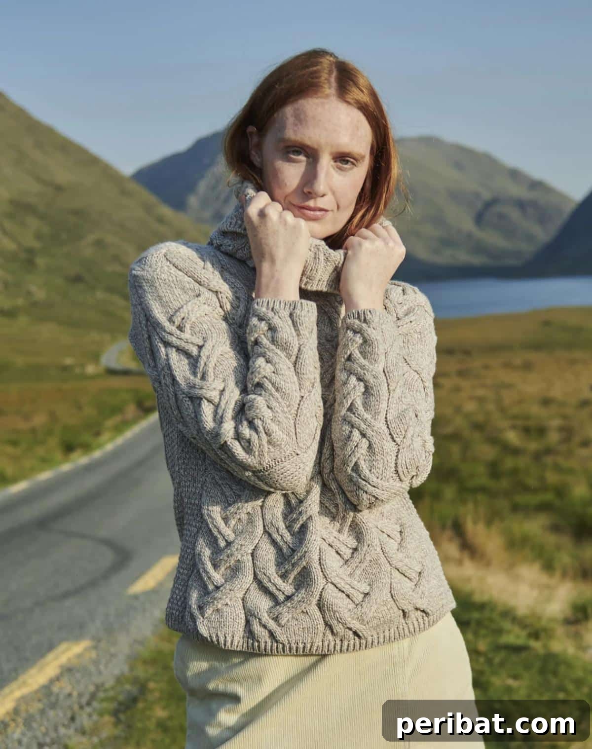 A lavish Aran Super Soft Merino Wool Cowl Neck Sweater, highlighting its rich texture and comfortable neck design.