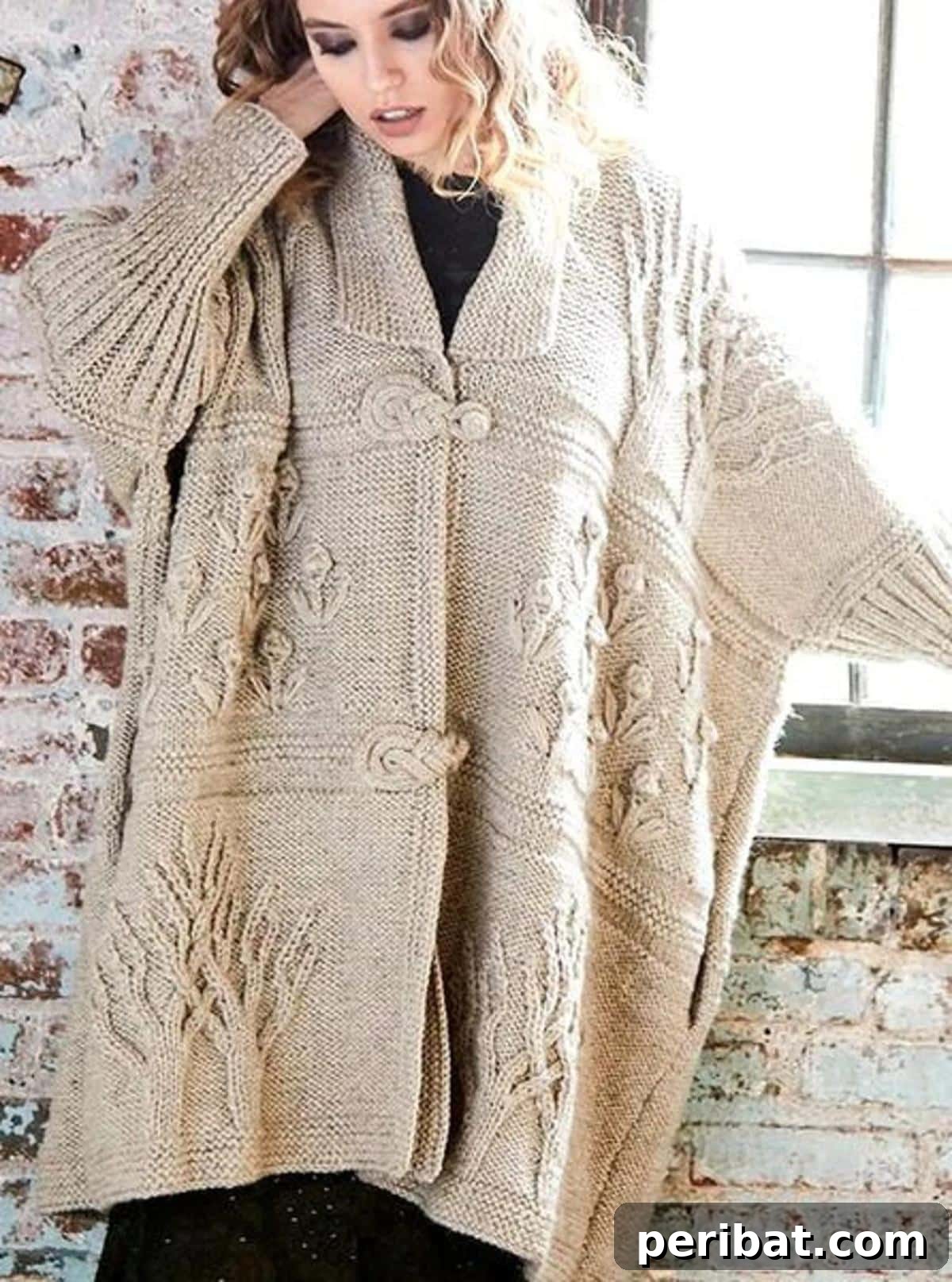The impressive Tree of Life Women's Cardigan Jacket, featuring intricate cable patterns and a large, cozy collar.