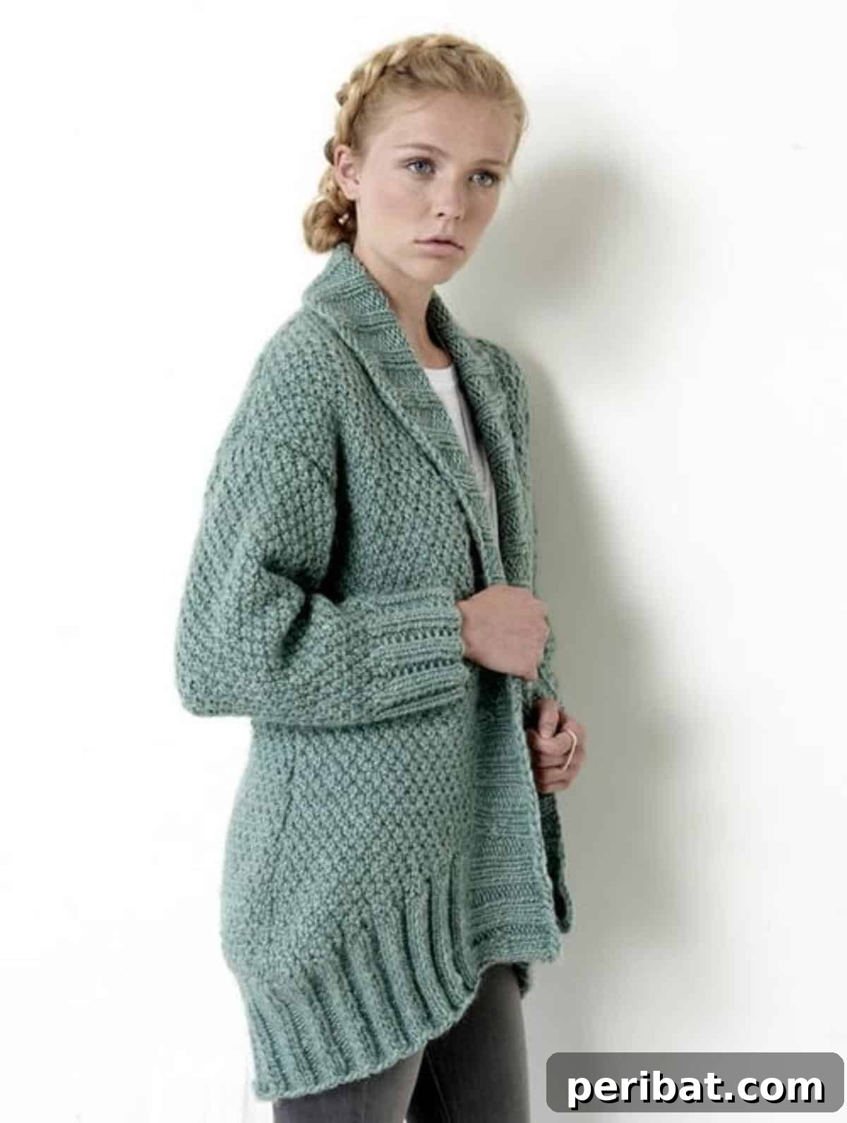 A cozy cocoon cardigan in a neutral shade, perfect for staying warm and stylish during colder weather.