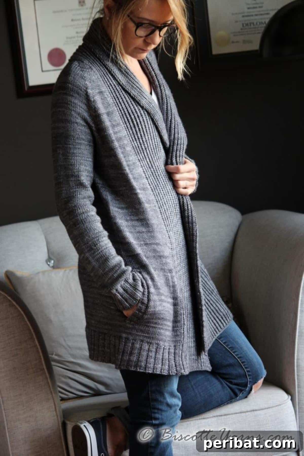 A woman comfortably wearing a pure comfort cardigan in a soft, neutral hue, highlighting its everyday appeal.