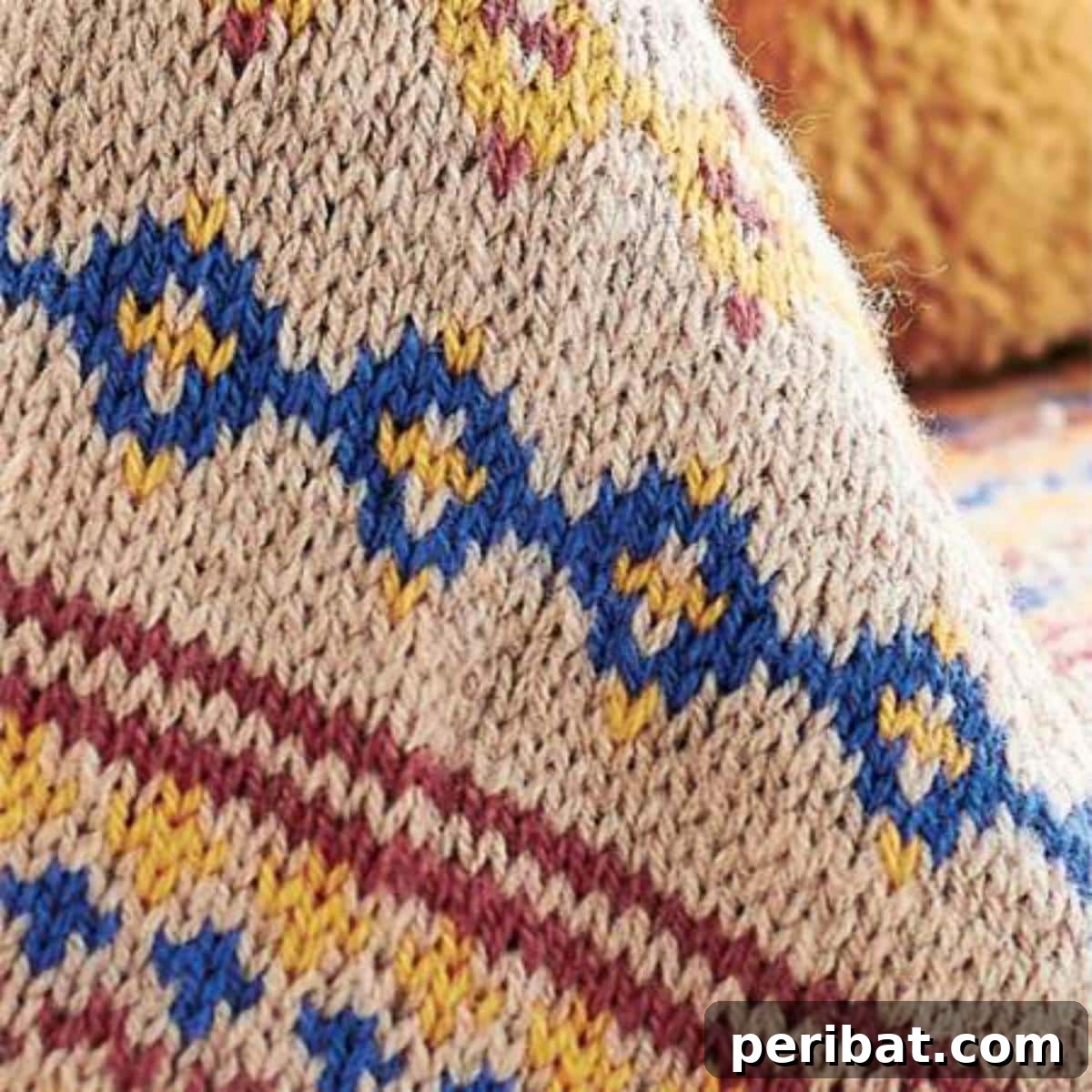 38 Adorable Baby Blanket Knitting Patterns 26 Fair Isle Baby Blanket - a vibrant blanket with intricate Fair Isle colorwork patterns.
