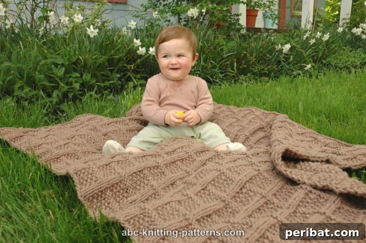 38 Adorable Baby Blanket Knitting Patterns 27 Lattice Baby Blanket - a textured blanket featuring a classic lattice or basketweave pattern.