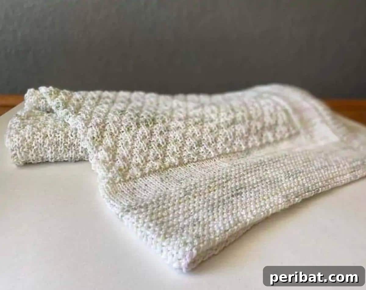 38 Adorable Baby Blanket Knitting Patterns 31 Tiny Gems Baby Blanket - a delicate blanket with a charming, subtle gemstone-inspired pattern.