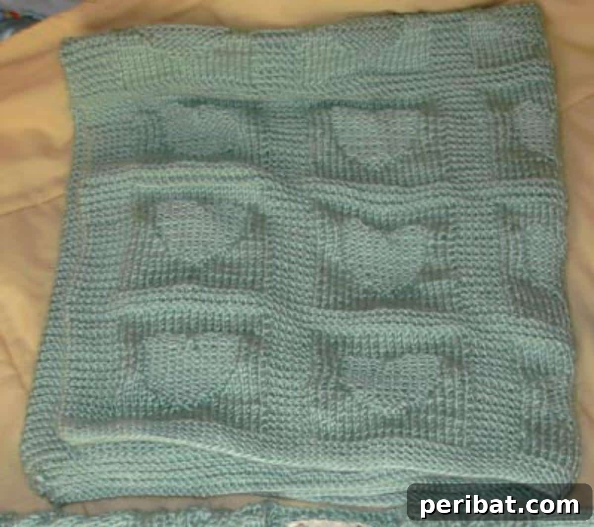 38 Adorable Baby Blanket Knitting Patterns 36 Heart Baby Blanket - a lovely blanket featuring an adorable heart motif in its knit pattern.