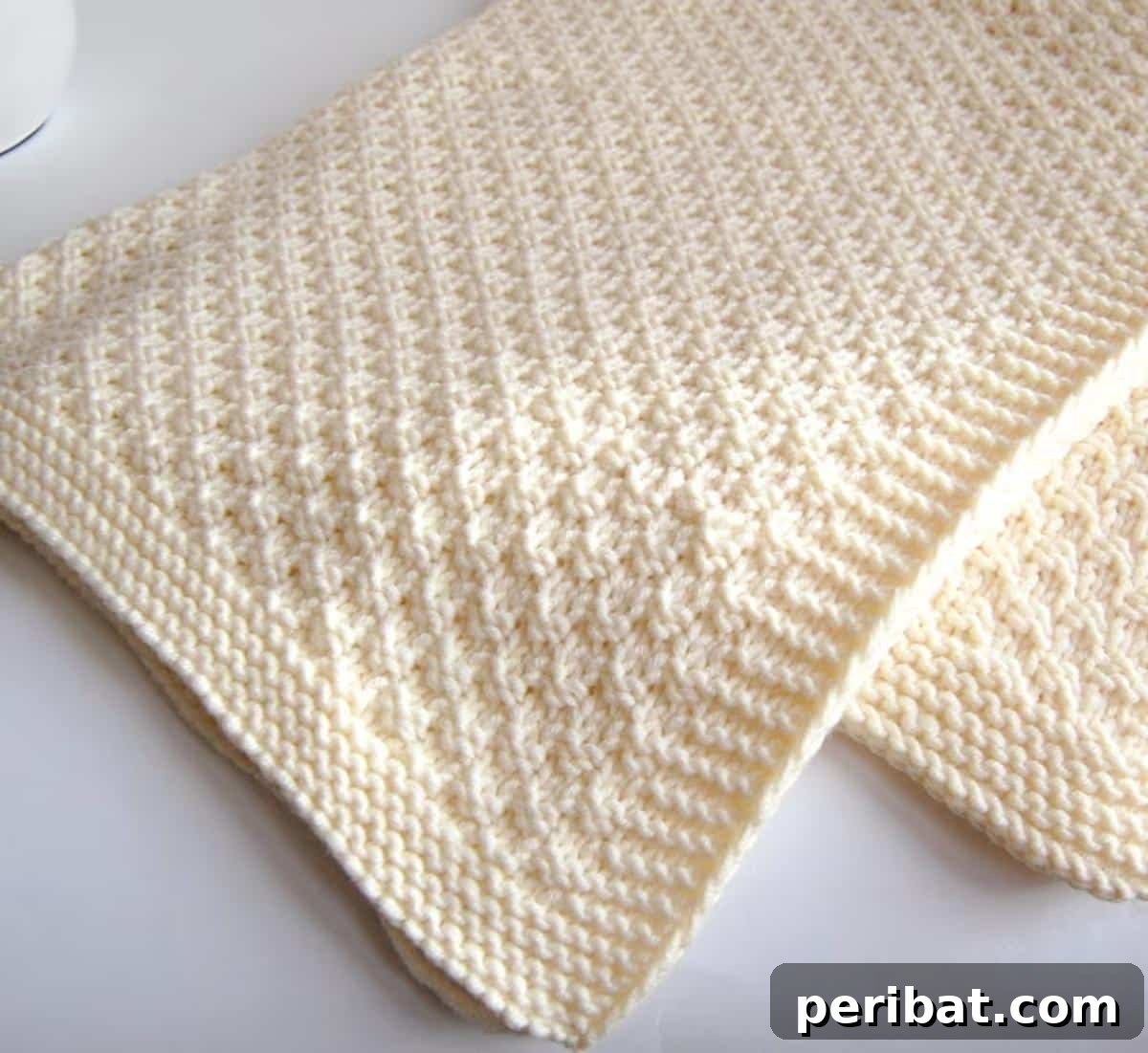 38 Adorable Baby Blanket Knitting Patterns 39 Knitted Baby Blanket - a versatile and appealing knitting pattern for a baby blanket.