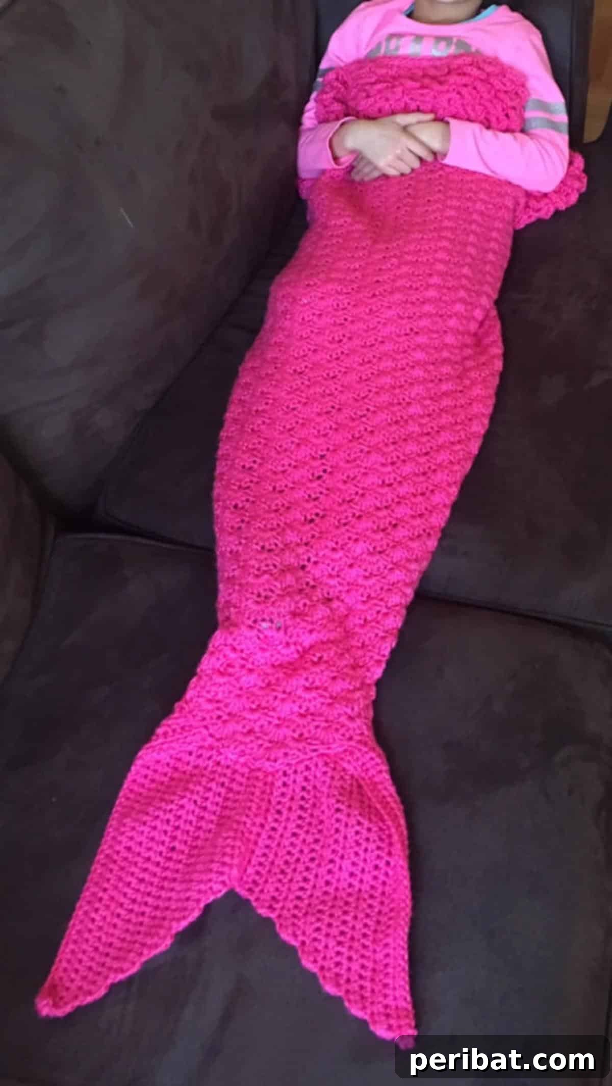 Free Mermaid Tail Blanket, a cozy aran-weight yarn pattern for children to imagine life under the sea.