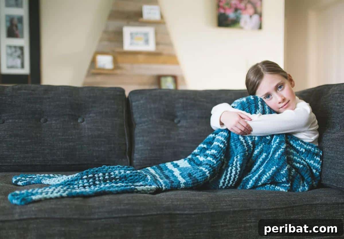 Mermaid Lap Blanket, a unique take on the mermaid tail style with a convenient foot pouch.