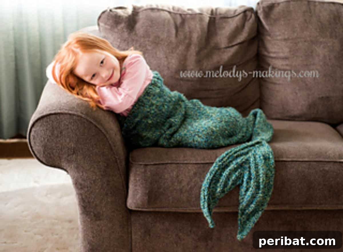 Knit Mermaid Blanket Pattern for children and adults, using super bulky yarn for quick, magical results.