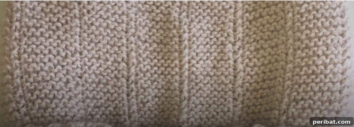 38 Cozy Slouchy Hat Knitting Patterns 12 Minimalist Broken Garter Slouch Beanie knitting pattern, offering a delightful texture with just 220 yards of DK yarn.