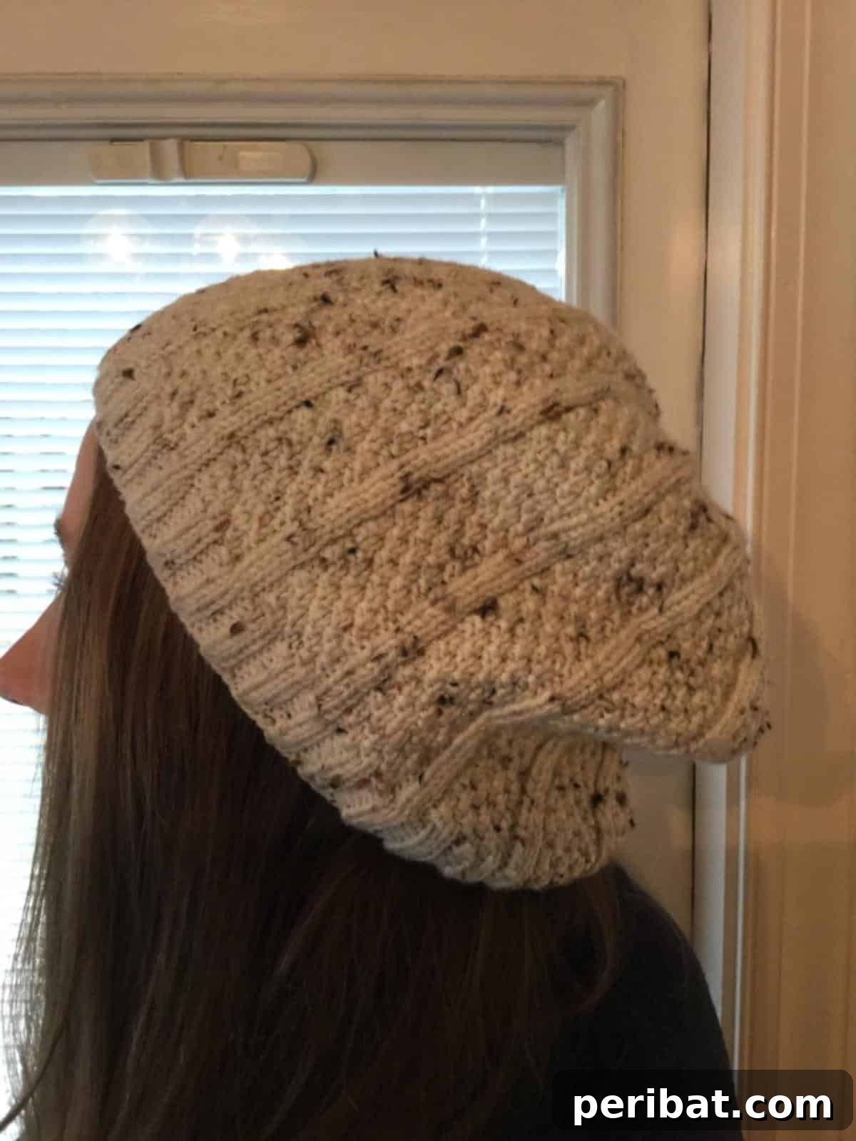 38 Cozy Slouchy Hat Knitting Patterns 16 The Travis Hat knitting pattern, a beloved design offering warmth and style, inspired by a custom request.