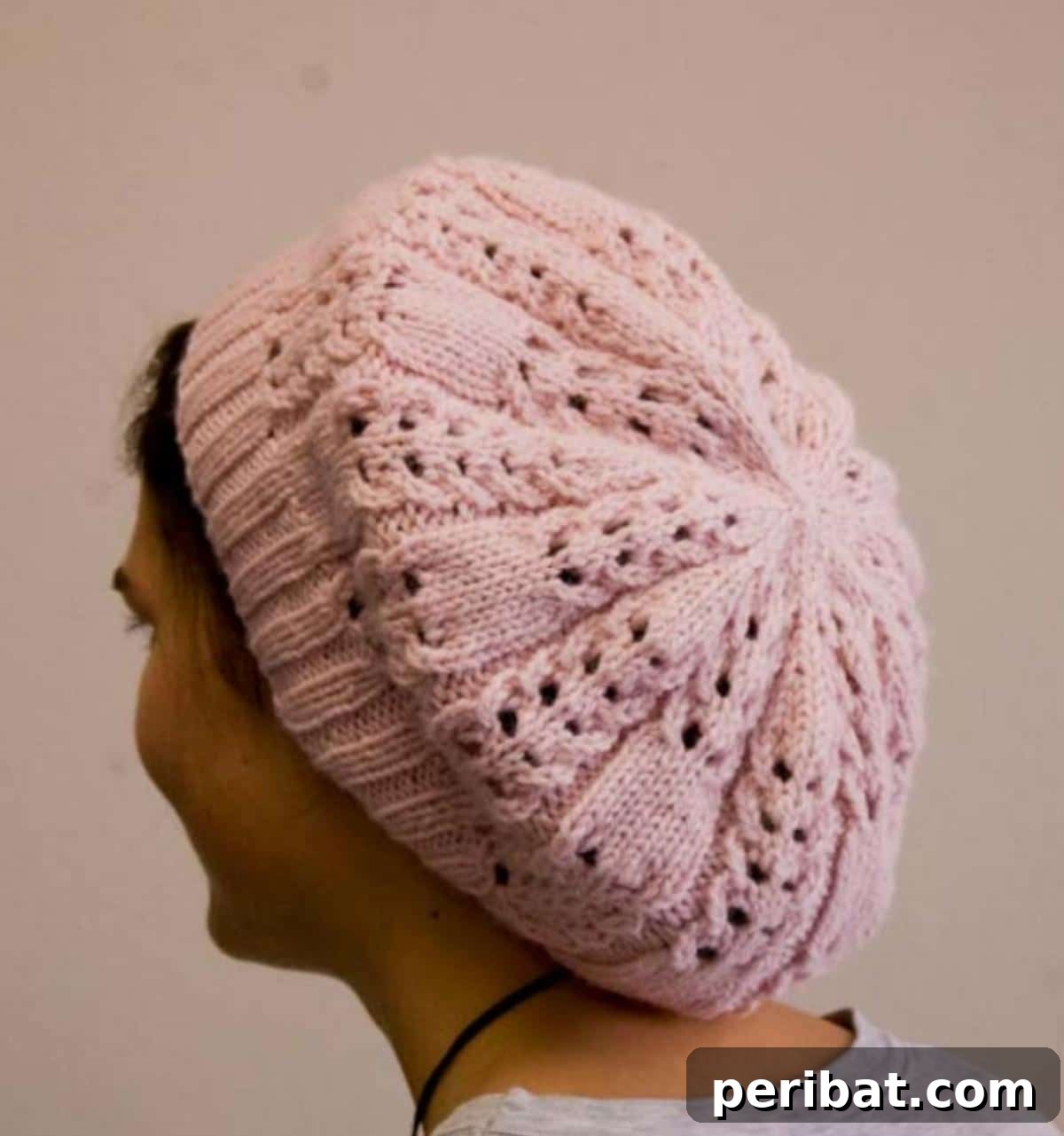 38 Cozy Slouchy Hat Knitting Patterns 20 Luxurious Dolce Slouch hat knitting pattern, featuring a lacy design in sumptuous yarn blends for feminine winter style.