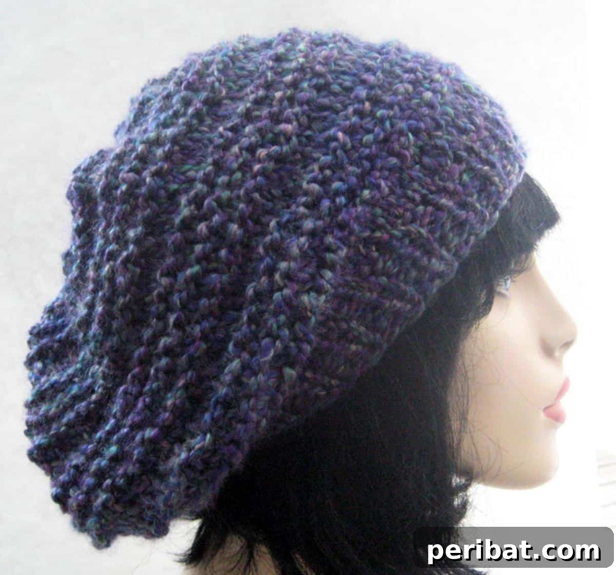 38 Cozy Slouchy Hat Knitting Patterns 30 Wager Hat knitting pattern, featuring an interesting stitch inspired by Barbara Walker for distinctive textures and comfortable warmth.
