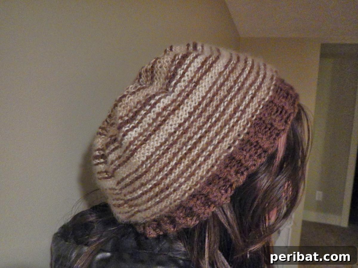 38 Cozy Slouchy Hat Knitting Patterns 37 Deforestation Hat knitting pattern, part of a series raising environmental awareness, inspired by the issue of deforestation.