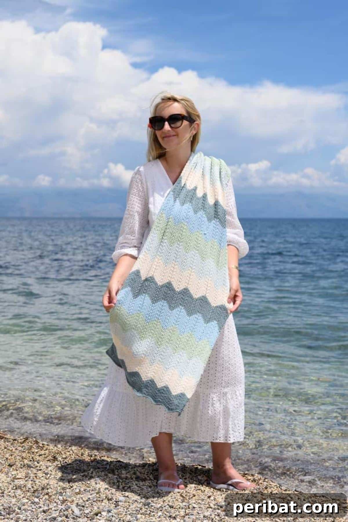 Divine Comfort: 36 Knitted Prayer Shawl Designs 13 A light and airy Sea Glass Shawl knitting pattern, inspired by the soft, muted colors of sea glass, made from 100% cotton, ideal for summer evenings and beach trips.