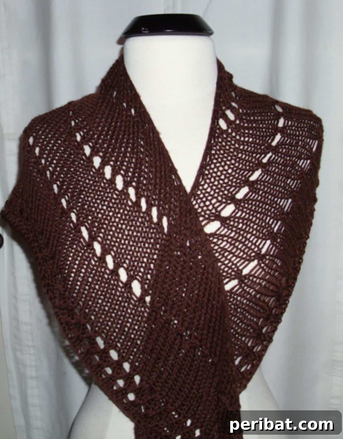 Divine Comfort: 36 Knitted Prayer Shawl Designs 15 An easy and versatile knitted shawl pattern, adaptable to any yarn choice and customizable in size, creating a simple yet gorgeous handmade accessory.