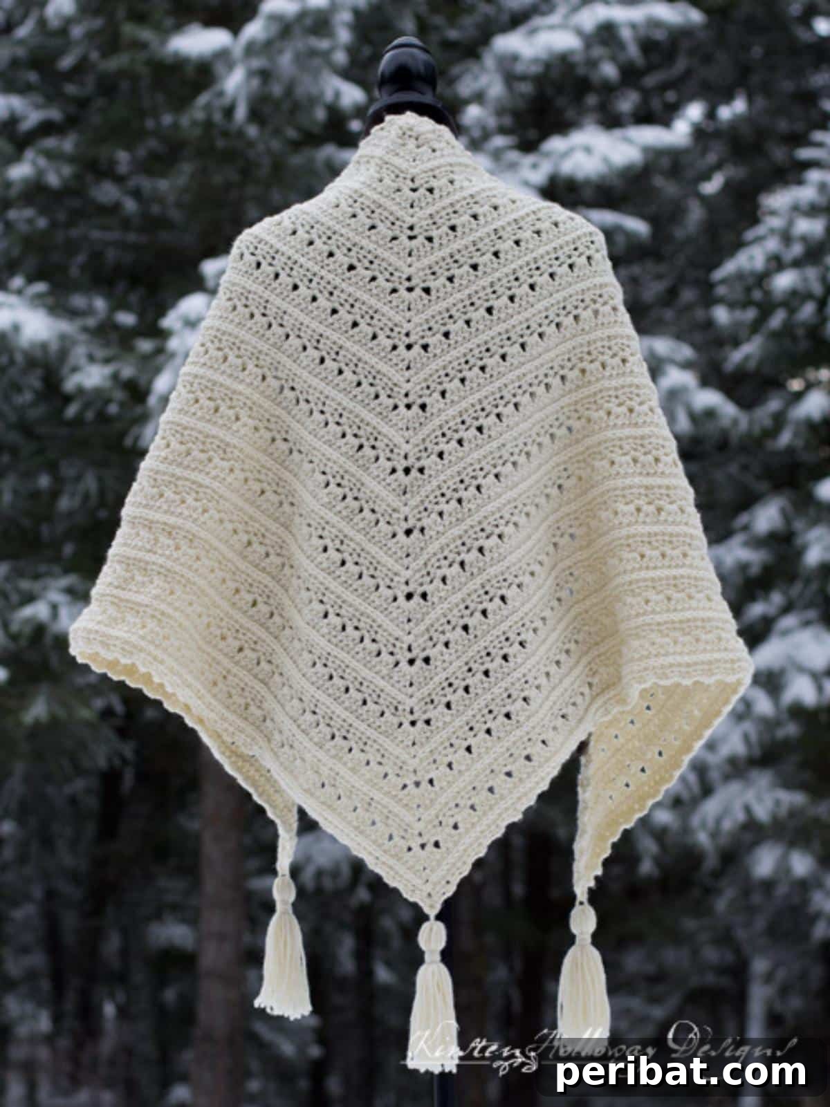 Divine Comfort: 36 Knitted Prayer Shawl Designs 18 A delightful Primrose and Proper Easy Triangle Shawl, blending classic shapes with delicate stitches, easy enough for advanced beginners and customizable in length.
