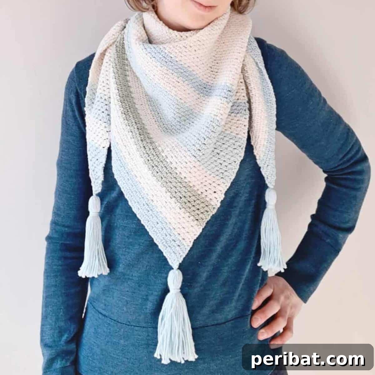 Divine Comfort: 36 Knitted Prayer Shawl Designs 30 An elegant Forget Me Not Shawl, a crocheted blanket with delicate colors inspired by forget-me-nots, featuring an easy 2-row repeat, ideal for beginners.
