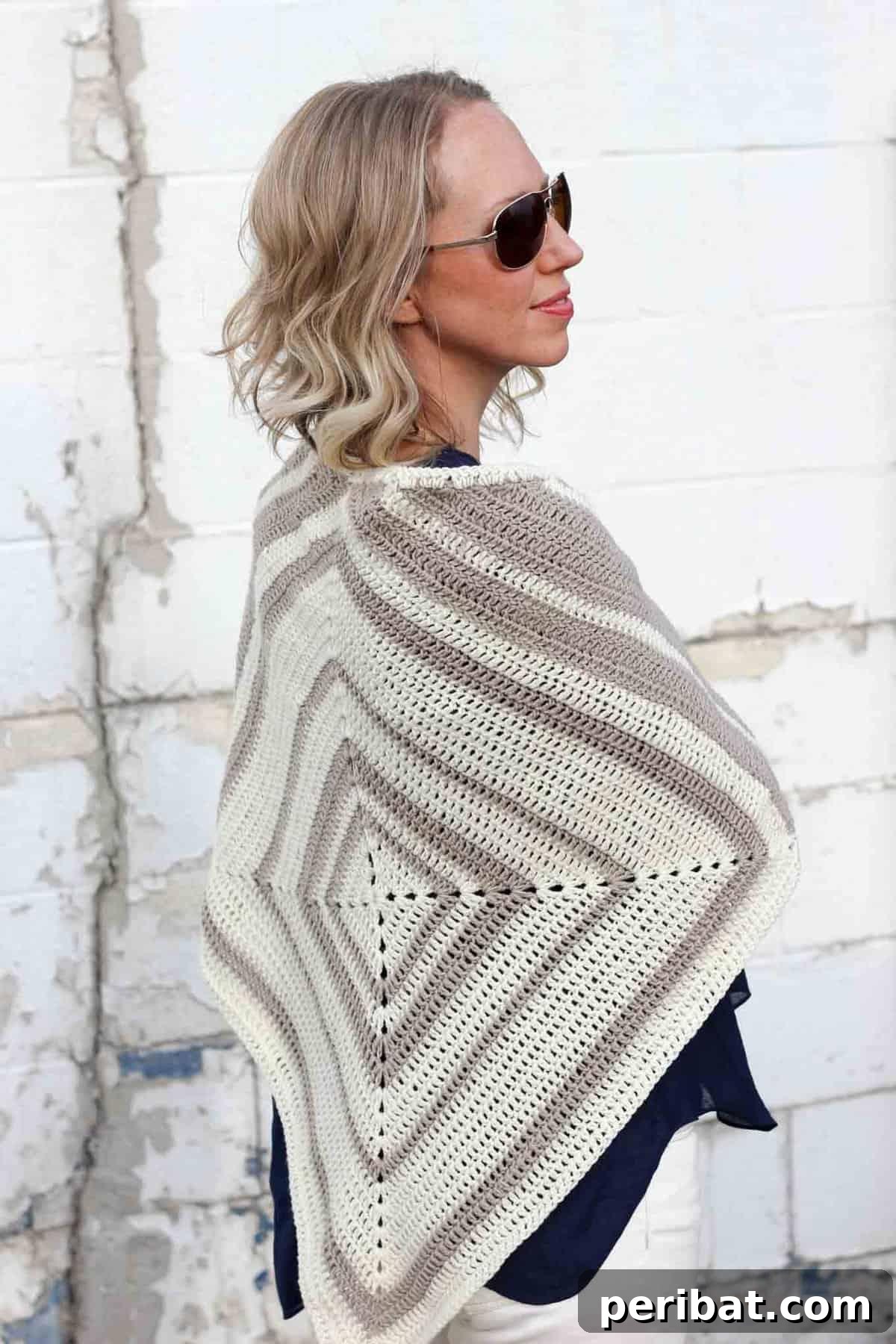 Divine Comfort: 36 Knitted Prayer Shawl Designs 32 A modern and simple Logan House Wrap, a free crochet pattern ideal for chilly summer nights, offering warmth and fashion with minimal weaving in ends.