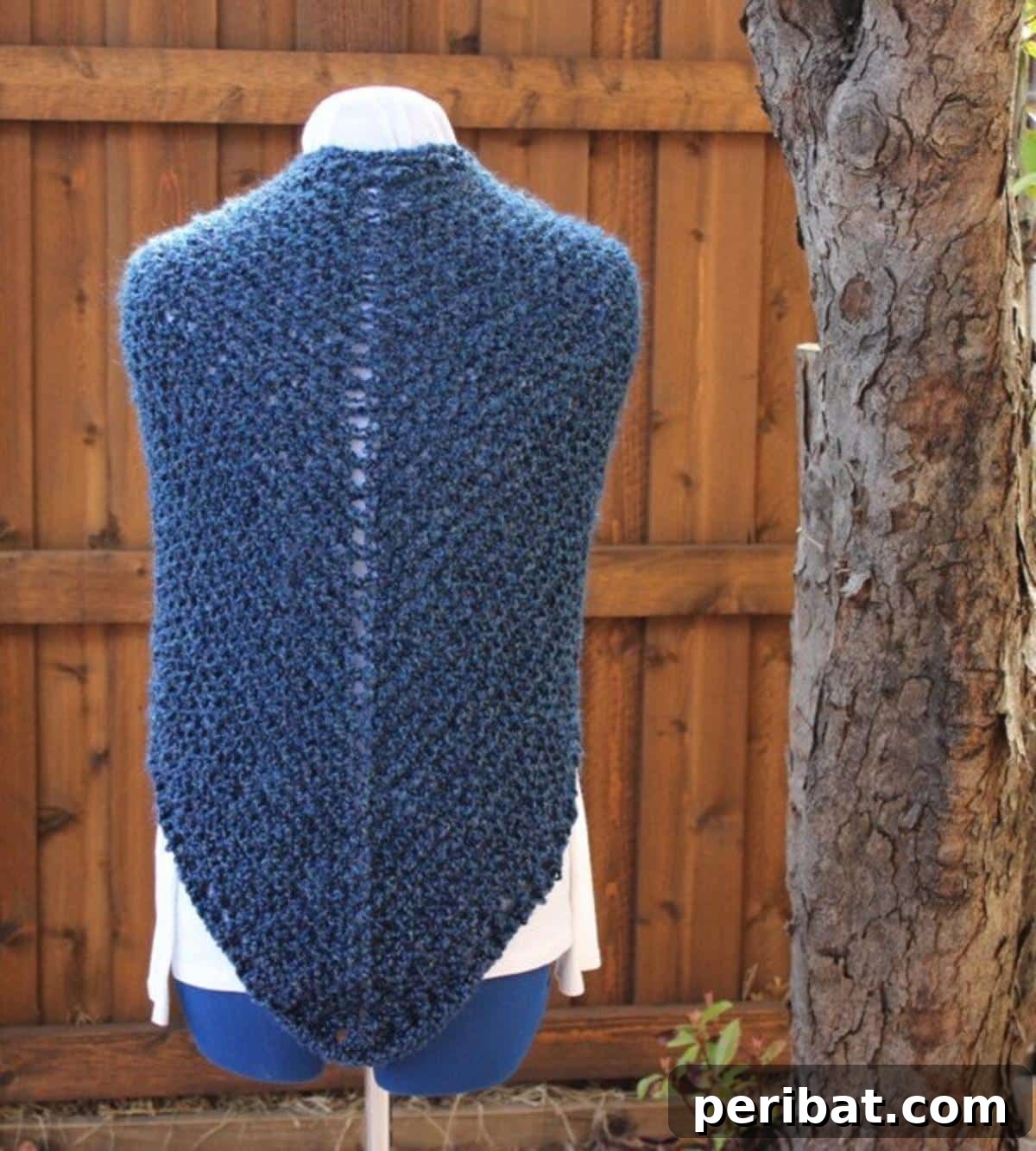 Divine Comfort: 36 Knitted Prayer Shawl Designs 36 A soft and warm Prayer Shawl, quickly knit with Homespun yarn, featuring an openwork edging for a delicate touch, ideal for gifting or cool evenings.