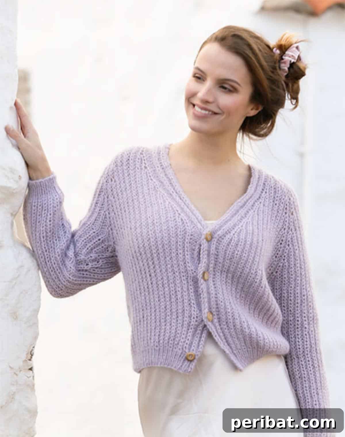 Lavender Breeze Cardigan, a wearable art piece made of English rib, combining comfort and style in a delicate lavender hue.