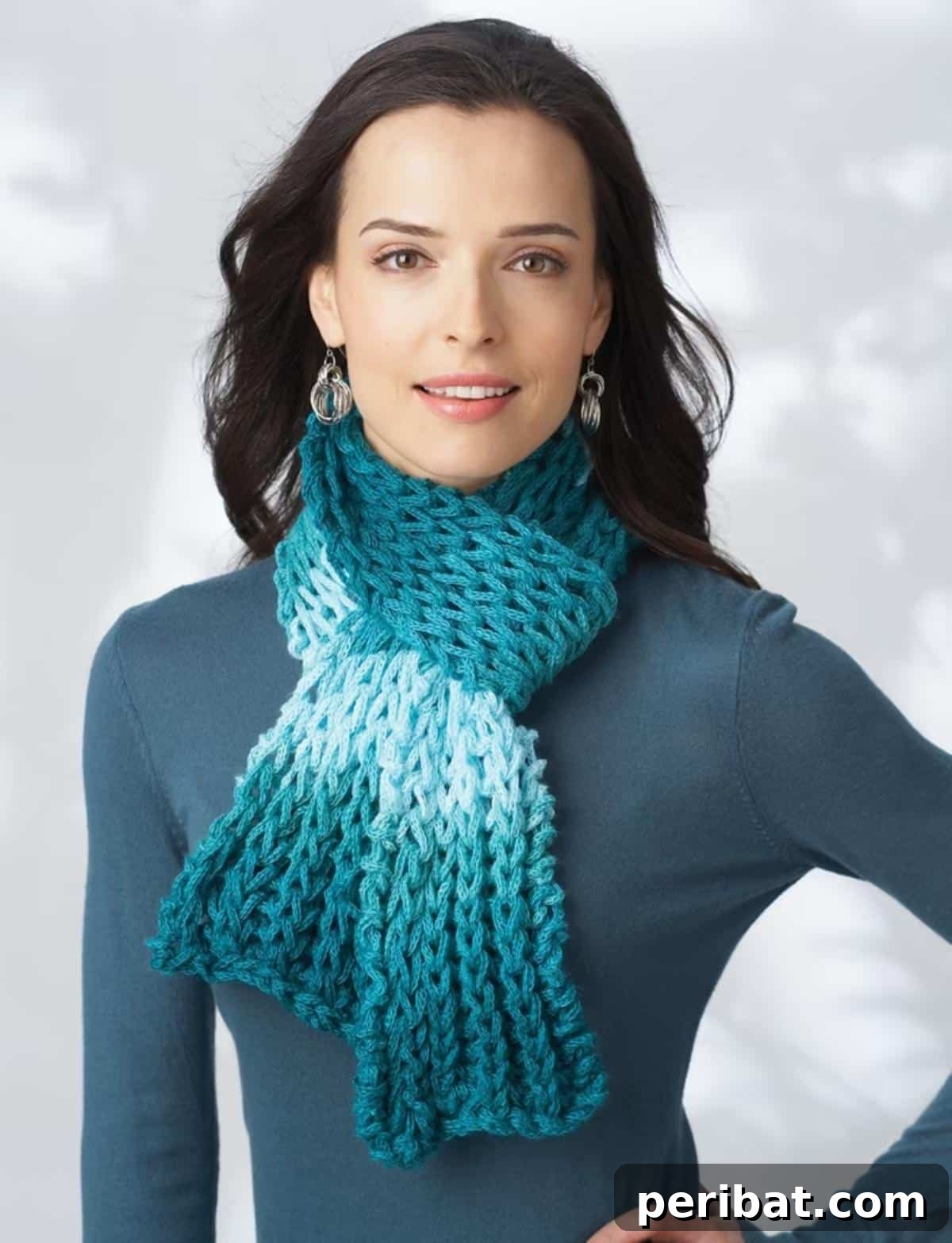 Brioche Scarf in Bernat Bargello, a large, textured scarf showcasing vibrant colors and brioche stitches.