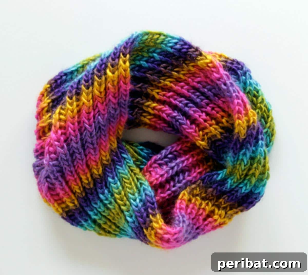 Brioche Cowl, showcasing the fluffy, thick texture of brioche knitting in a simple cowl design, suitable for beginners.