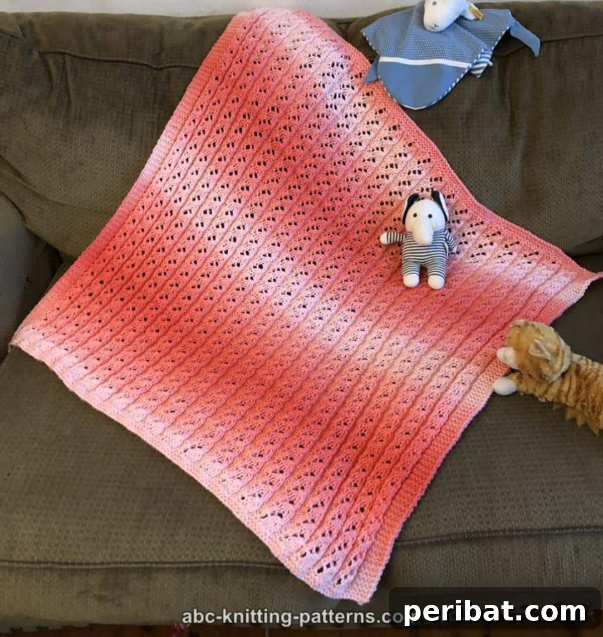 18 Timeless Aran Knitting Patterns 14 Waterfall Lace Baby Blanket, an easy and beautiful pattern.