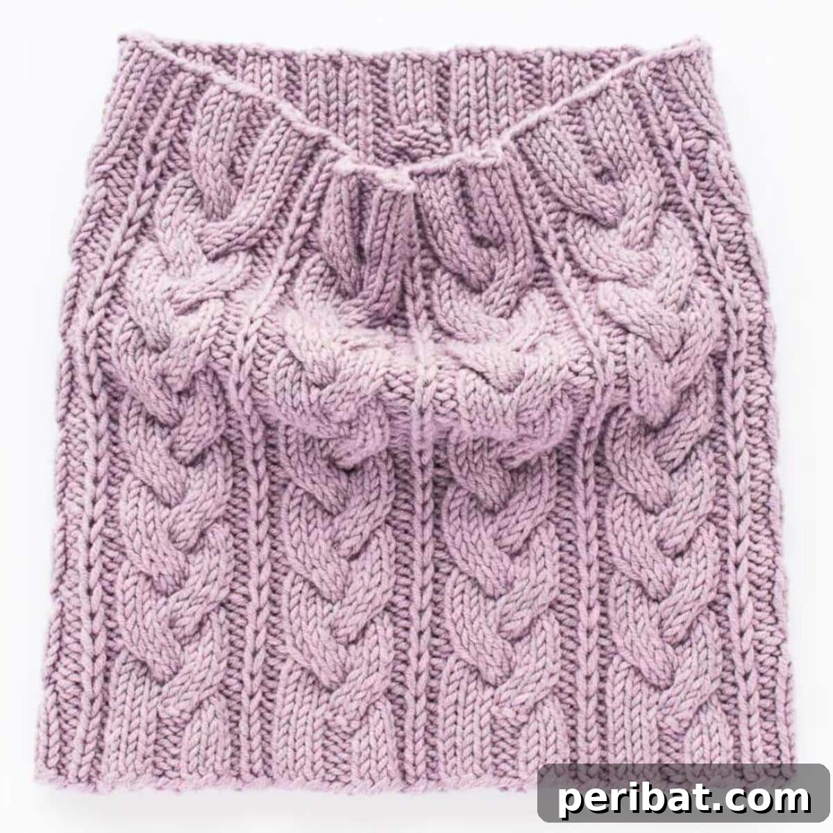 18 Timeless Aran Knitting Patterns 16 Summit Cowl, a warm accessory with a complicated cable design.