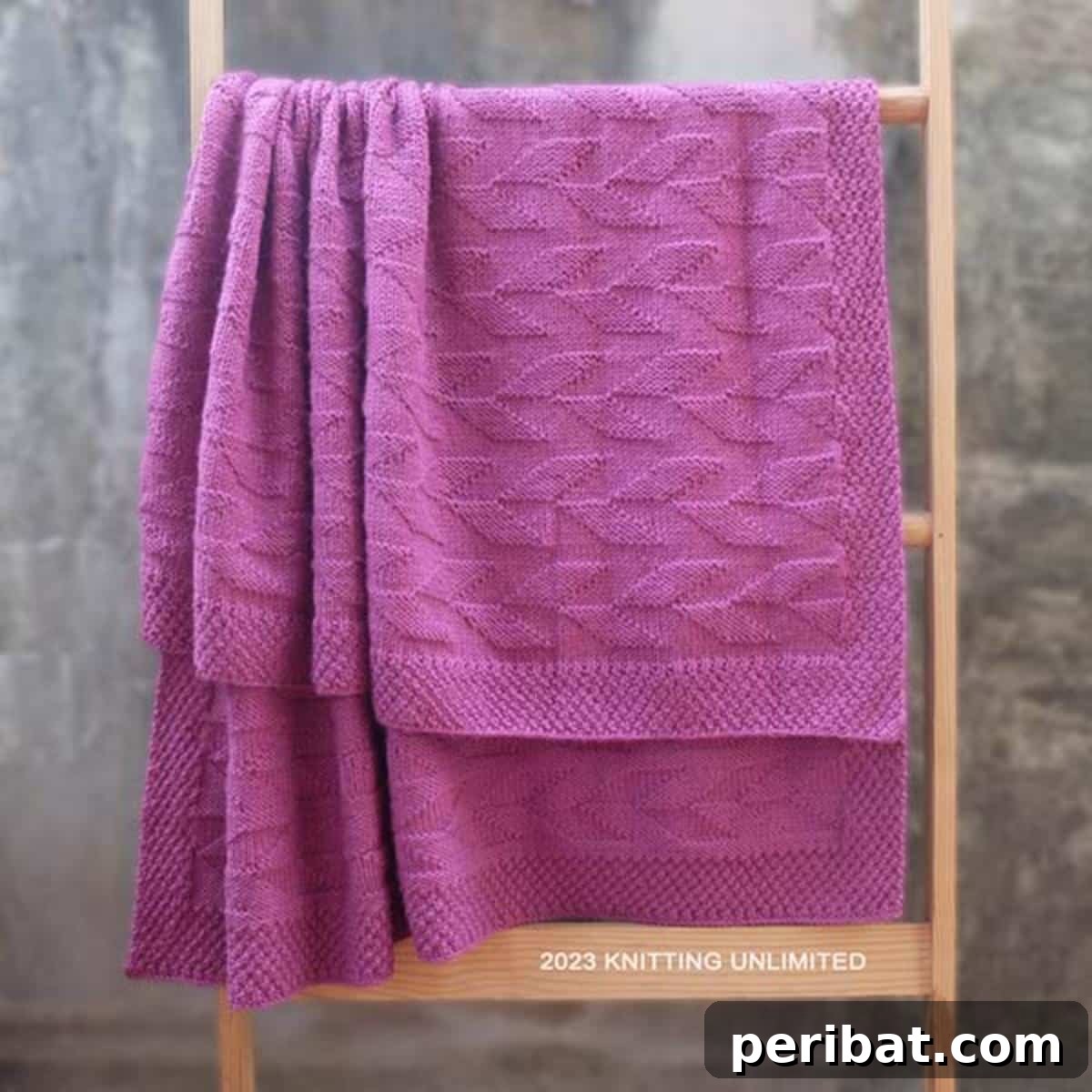 18 Timeless Aran Knitting Patterns 17 Welted Leaf Blanket, bringing nature's beauty indoors.